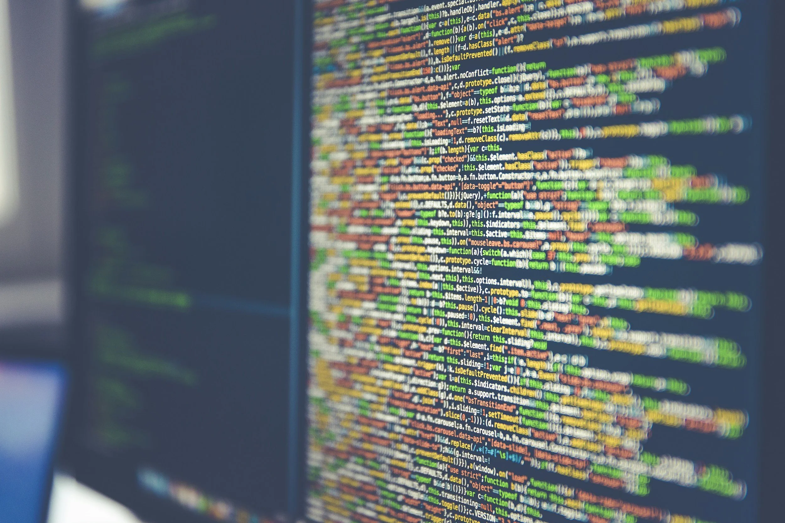 Code on a monitor, representing the Cornell Wardrobe app build